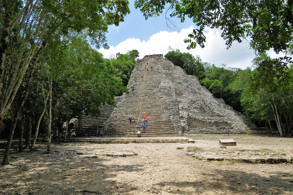 People Climbing Concrete Stairs